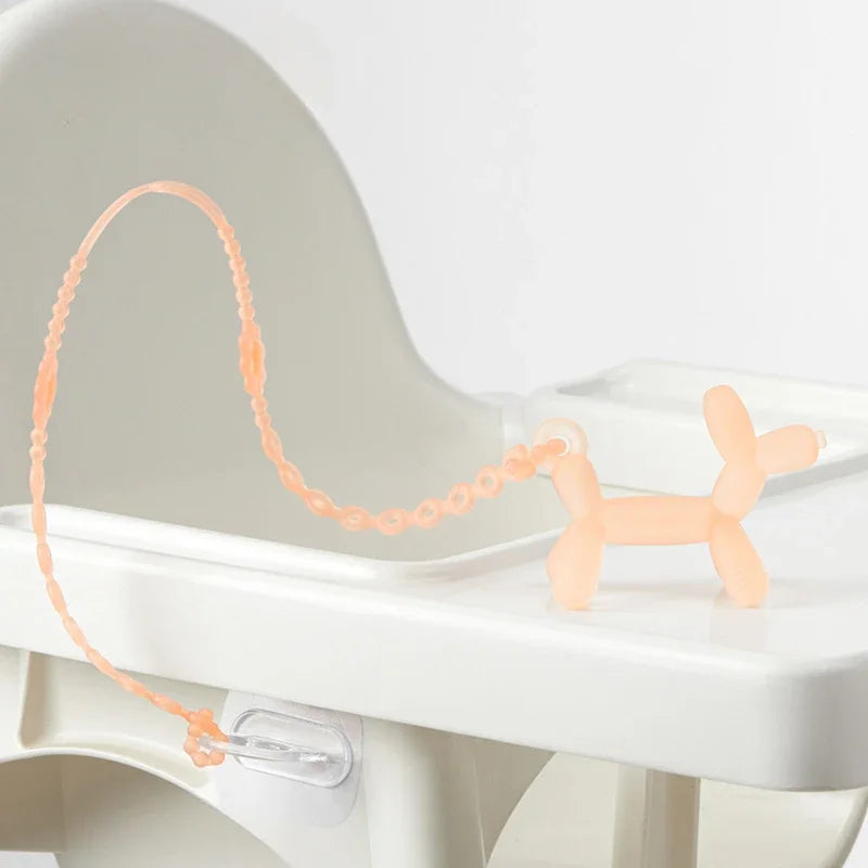 Balloon dog teether, baby food-grade silicone teething stick toy with anti-drop chain, teether and bite toy.